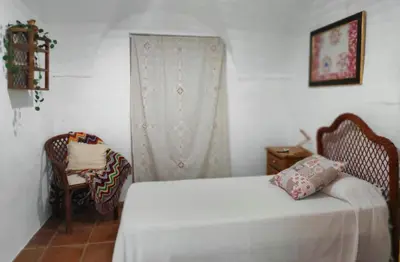 Cama o camas de una habitación en Vivienda Rural El Retiro