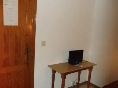 Una televisión o centro de entretenimiento en Hostal San Francisco