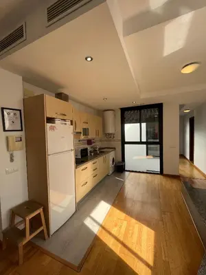 Una cocina o zona de cocina en Apartamento con Terraza Privada