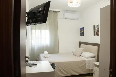 Cama o camas de una habitación en habitacion acogedora con limpieza incluida- buena conexion