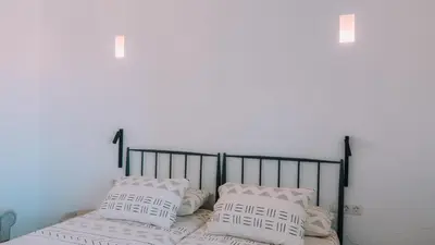 Cama o camas de una habitación en LyriosHomes Cortijo San Isidro