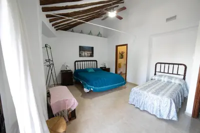 Cama o camas de una habitación en El Parador de Carmencita