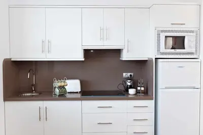 Una cocina o zona de cocina en Casa Vagón Vía Verde de la Sierra