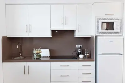 Una cocina o zona de cocina en Casa Vagón Vía Verde de la Sierra