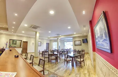 Una televisión o centro de entretenimiento en Hostal Garlu
