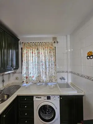 Una cocina o zona de cocina en Casa del Lago la Encantada !!!!En temporada incluye acceso piscina Las 2 columnas!!!!!