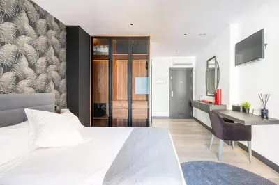 Cama o camas de una habitación en Atico moderno en Nervion con terraza