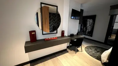 Una televisión o centro de entretenimiento en Atico moderno en Nervion con terraza