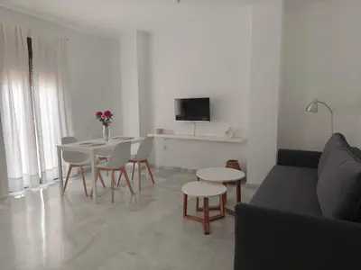 Una televisión o centro de entretenimiento en Macarena & parking gratis