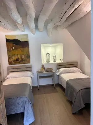 Cama o camas de una habitación en Alojamiento rural Peña de los Enamorados