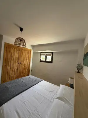 Cama o camas de una habitación en Alojamiento rural Peña de los Enamorados