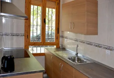 Una cocina o zona de cocina en CASA PATIO LAS PALMERAs 7 y 8