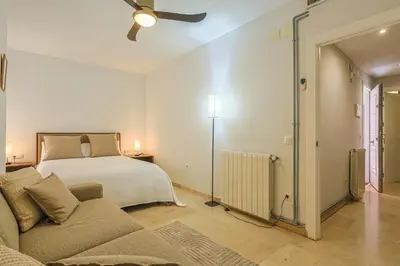 Cama o camas de una habitación en Lirios de Sevilla - Vacacional Sevilla