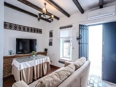 Una televisión o centro de entretenimiento en Apartment in Andalusia with Scenic Views