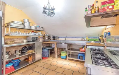 Una cocina o zona de cocina en Holiday Home Periana - 03