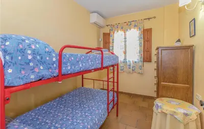 Cama o camas de una habitación en Holiday Home Periana - 03