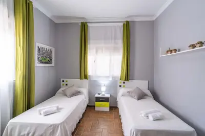 Cama o camas de una habitación en Casa Rural La Perla.