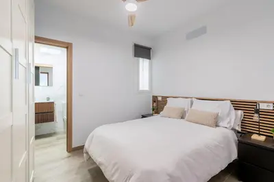 Cama o camas de una habitación en Pesquera Suites