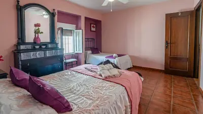 Cama o camas de una habitación en Puerto Nuevo by Ruralidays
