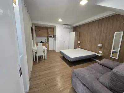 Cama o camas de una habitación en Deluxe Alameda studio