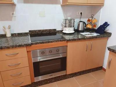 Una cocina o zona de cocina en Holiday Home El Patio