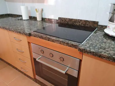 Una cocina o zona de cocina en Holiday Home El Patio
