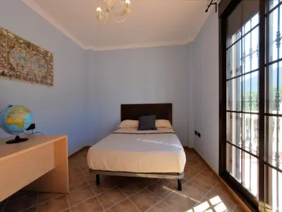Cama o camas de una habitación en Villa in Villanueva del Trabuco with Jacuzzi