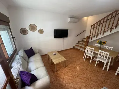 Una televisión o centro de entretenimiento en Casa Girasoles - Centro Campillos