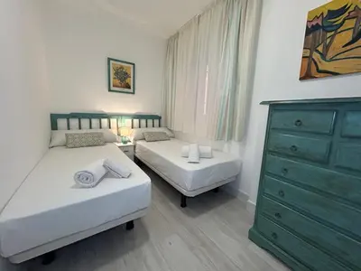 Cama o camas de una habitación en Apartamento Loft Cervantes