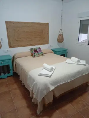 Cama o camas de una habitación en Casa Rural la Sierra del Viento
