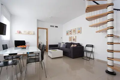 Una televisión o centro de entretenimiento en Apartamentos San Leandro Ensenada