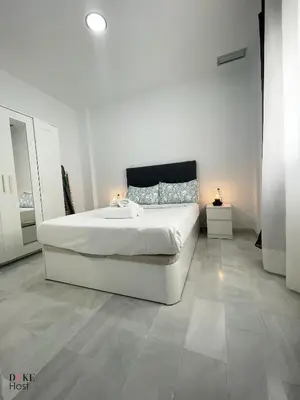 Cama o camas de una habitación en Divina Enfermera Apartments