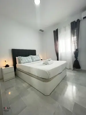 Cama o camas de una habitación en Divina Enfermera Apartments