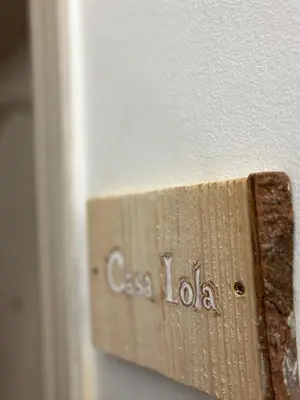Certificado, premio, señal o documento que está expuesto en Casa Lolita