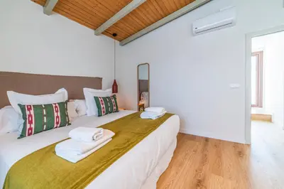 Cama o camas de una habitación en Los Patios de Feria - Jacarandas