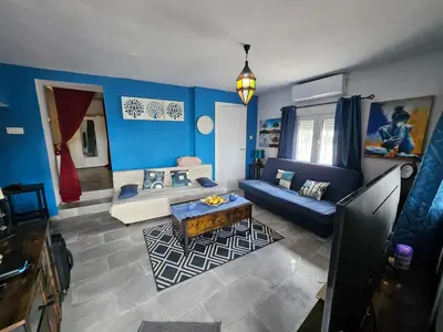 Cama o camas de una habitación en Le petit paradis de Nicole