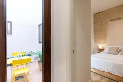 Cama o camas de una habitación en Refugio con encanto, patio y piscina