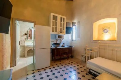 Una cocina o zona de cocina en Casa de la Carrera Cantillana