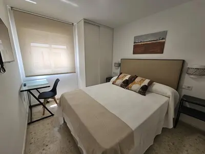 Cama o camas de una habitación en Apartamento Reyes Católicos