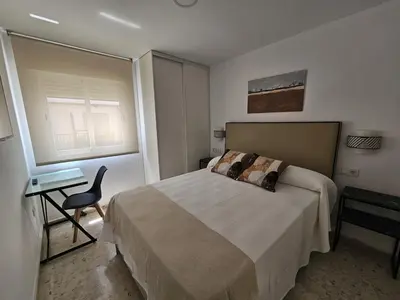 Cama o camas de una habitación en Apartamento Reyes Católicos