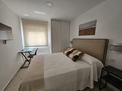 Cama o camas de una habitación en Apartamento Reyes Católicos