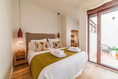 Cama o camas de una habitación en Los Patios de Feria - Luz de Poniente