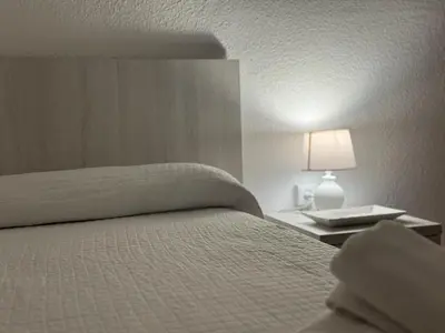 Cama o camas de una habitación en Los Jardines de la Magdalena