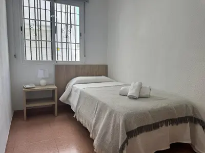 Cama o camas de una habitación en Los Jardines de la Magdalena