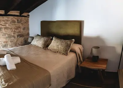 Cama o camas de una habitación en Casa de los Abuelos en Baeza