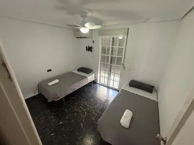 Cama o camas de una habitación en Apartamento Familiar