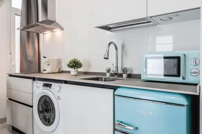 Una cocina o zona de cocina en Modern and Cozy Apartment, Nervión Seville bajo B