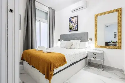 Cama o camas de una habitación en Nice newly renovated apartment in Seville Collantes A2