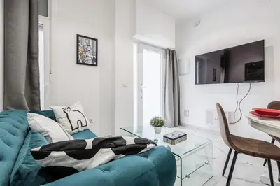 Una televisión o centro de entretenimiento en Nice newly renovated apartment in Seville Collantes A2