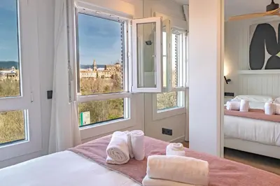 Cama o camas de una habitación en Geysotur Ribera Luxury Suites